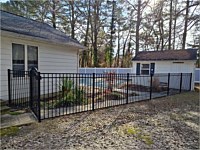 <b>54 high black aluminum Ascot style pool code fence with one 4ft wide arched top walk gate to include lockable keystone latch</b>